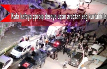 Kafa kafaya çarpıp dereye uçan araçtan sağ kurtuldular