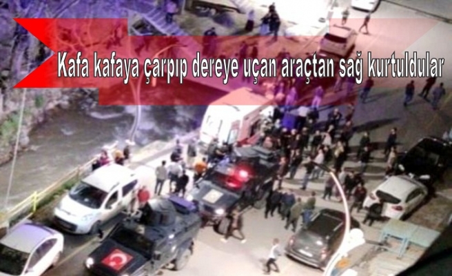 Kafa kafaya çarpıp dereye uçan araçtan sağ kurtuldular