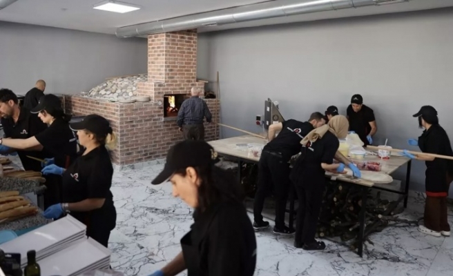 Süryani işadamı pizza salonu açtı