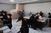Süryani işadamı pizza salonu açtı