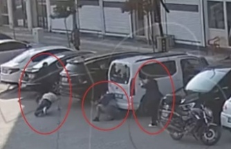 Saldırıda silah çeker kocasını korudu