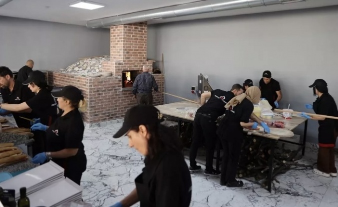 Süryani işadamı pizza salonu açtı